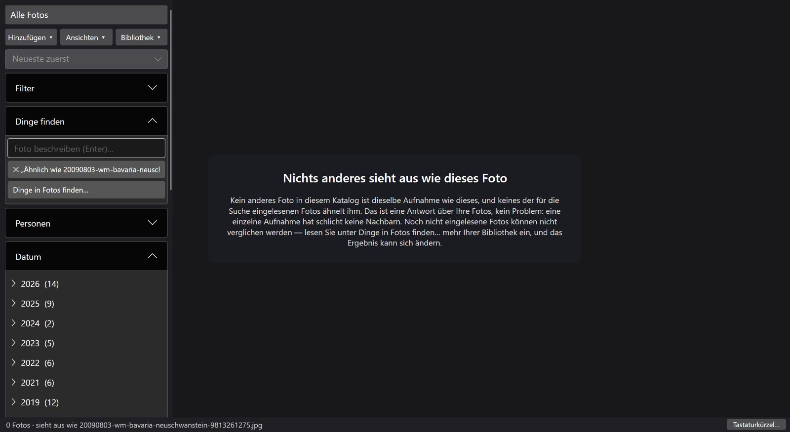 Ein Foto oben im Raster angeheftet, darunter die ihm ähnelnden Fotos nach Rang sortiert.