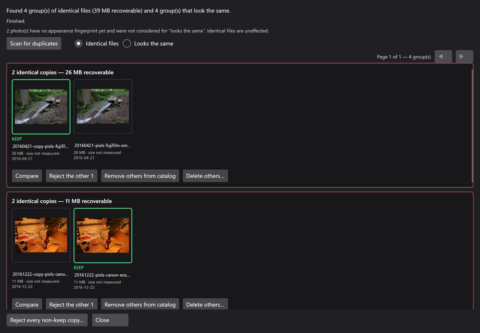 The duplicate review window listing groups of byte-identical files, with the suggested keeper marked.