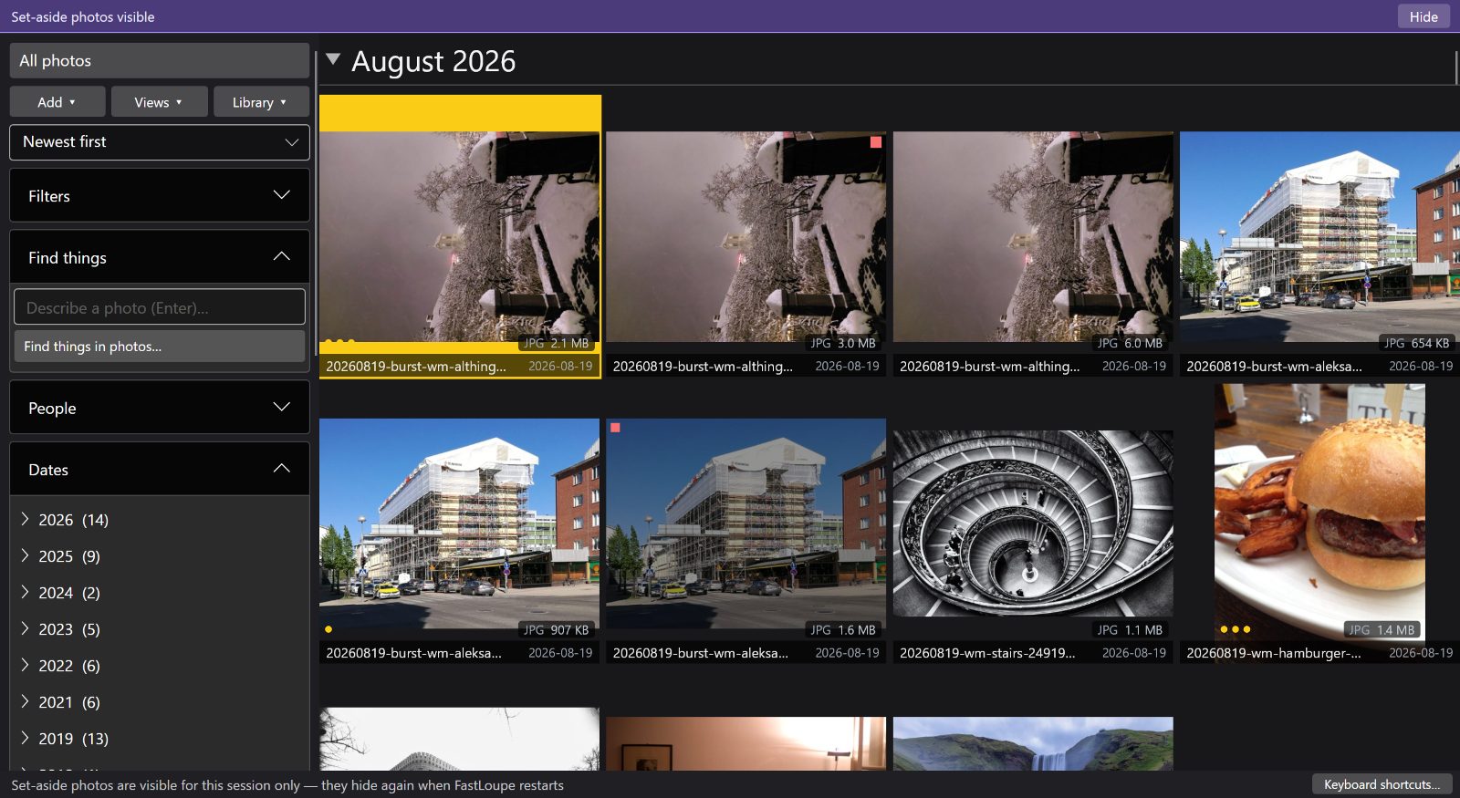 The same grid with the set-aside photographs revealed and a banner above it.